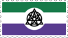 a digital stamp which represents the nonhuman unity pride flag. a flag with three horizontal stripes (green, white, purple) and a mix of the otherkin symbol and the therian symbol in the middle
